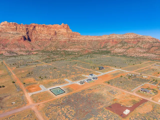 View of rural area featuring a desert landscape and a mountain backdrop