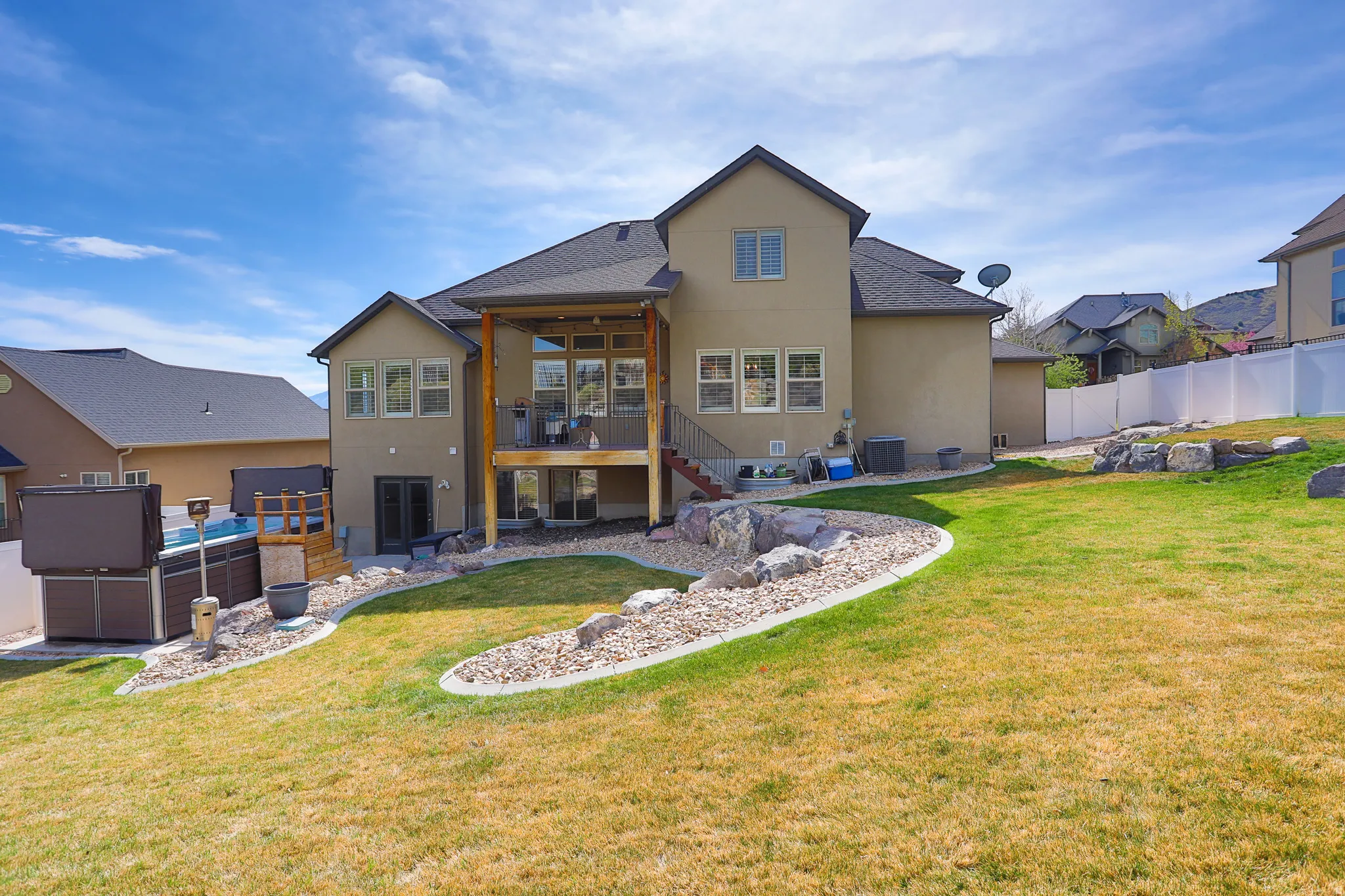 The back. Notable features include the large deck as well as that basement entry you saw earlier.