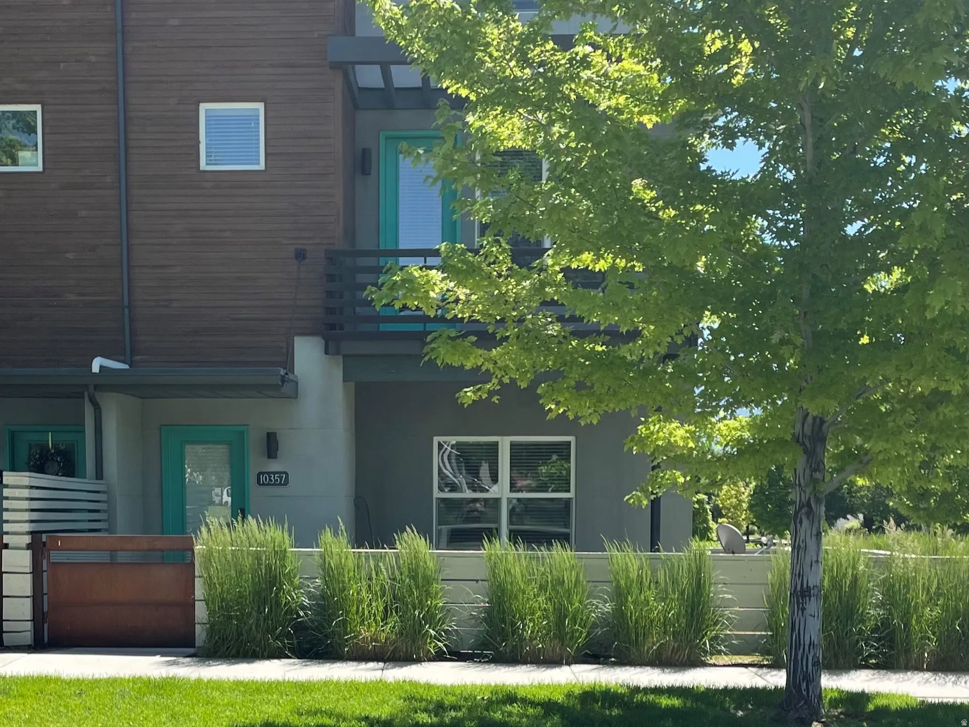 Springtime show tree lined streets. Row-end unit with views. Right across the street from a park and easy walking access to everything Daybreak!