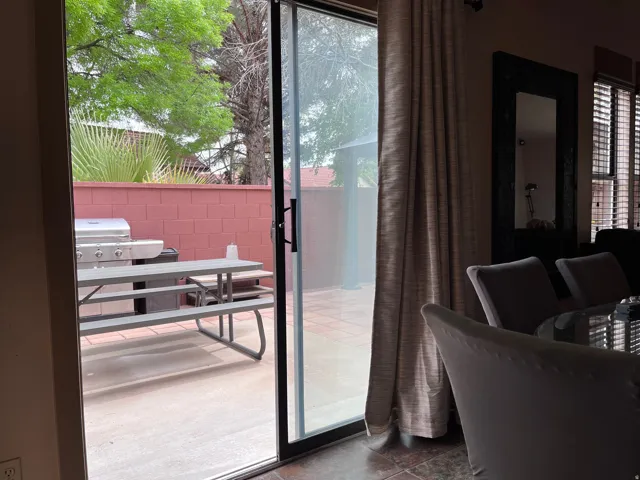 Doorway to outside featuring healthy amount of natural light
