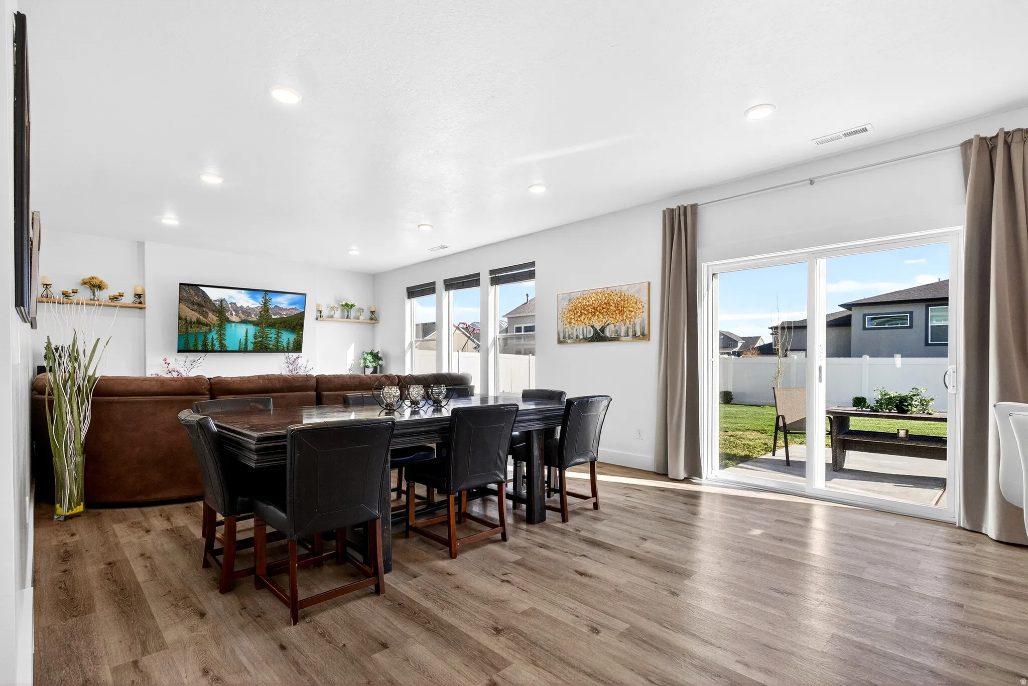 sliding door to backyard off dining open living space