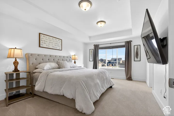 Primary bedroom with en-suite and walk in closet