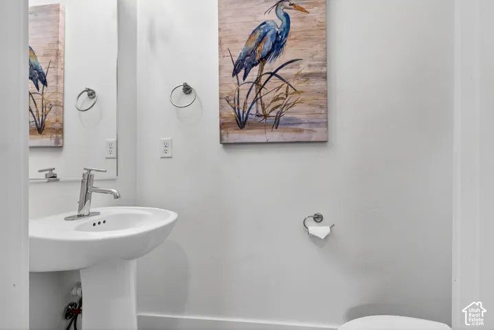 Half bathroom off of mudroom on main level
