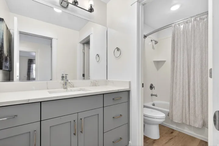 Full bathroom with extra long vanity