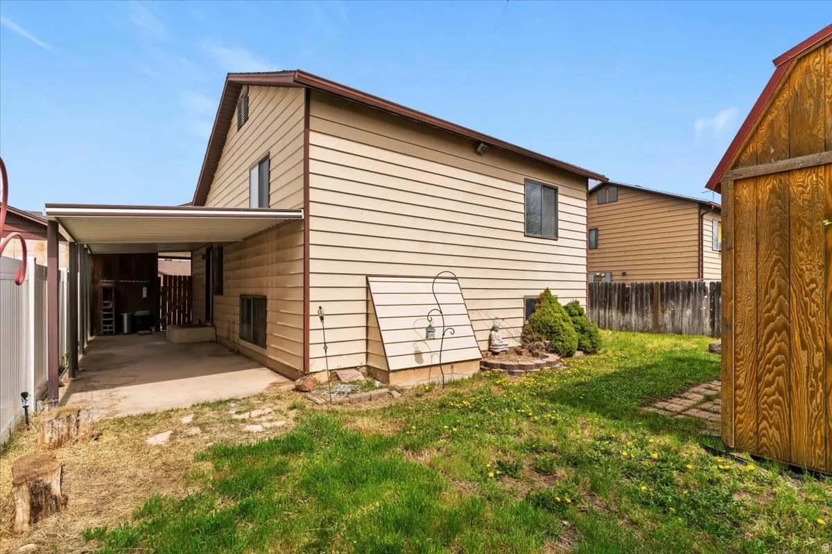 View of side of property featuring a patio