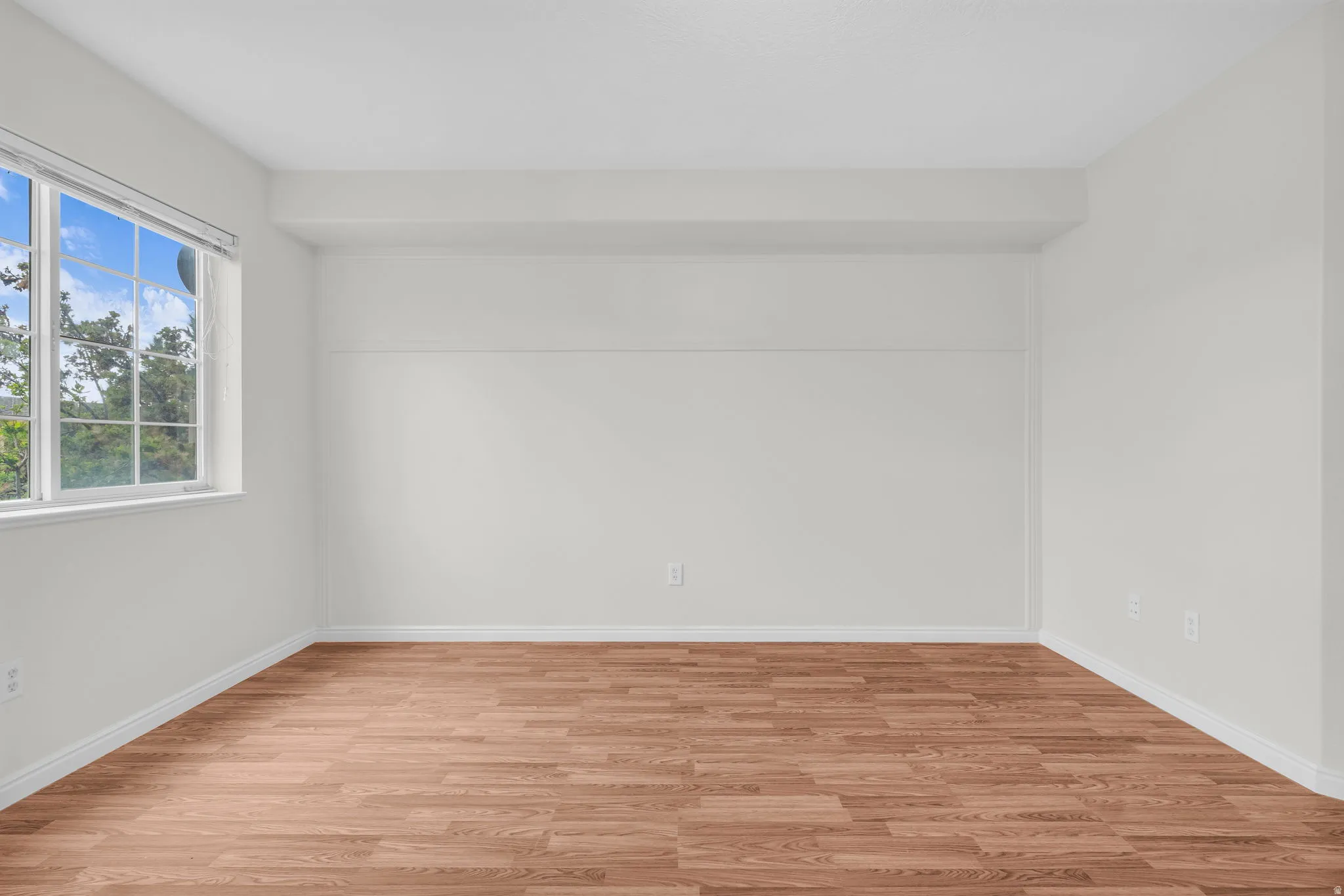 Spare room with light wood-style floors