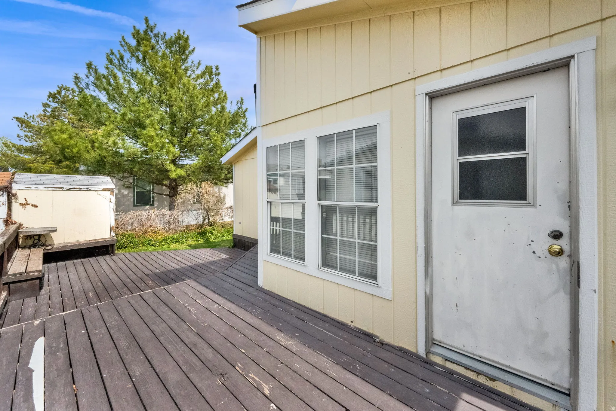 Wooden terrace with a storage unit