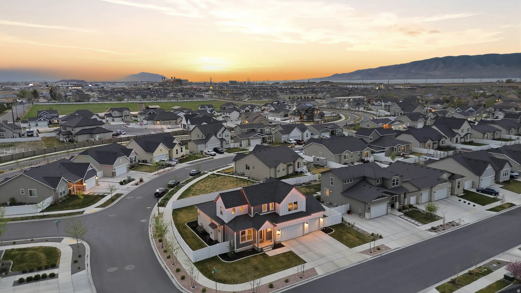 Aerial view at dusk of a mountain view and a residential view