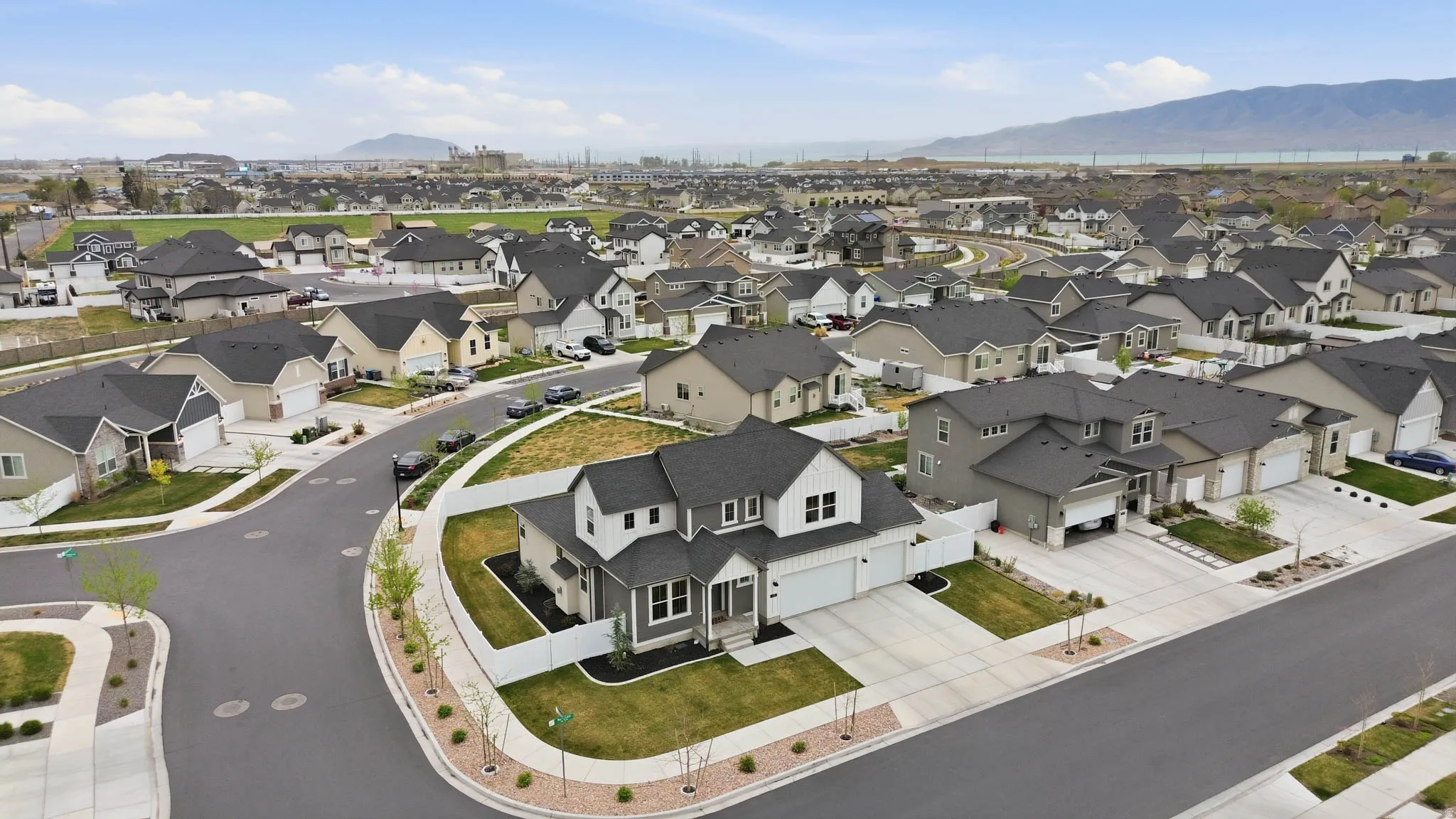 Aerial view of residential area with a mountainous background