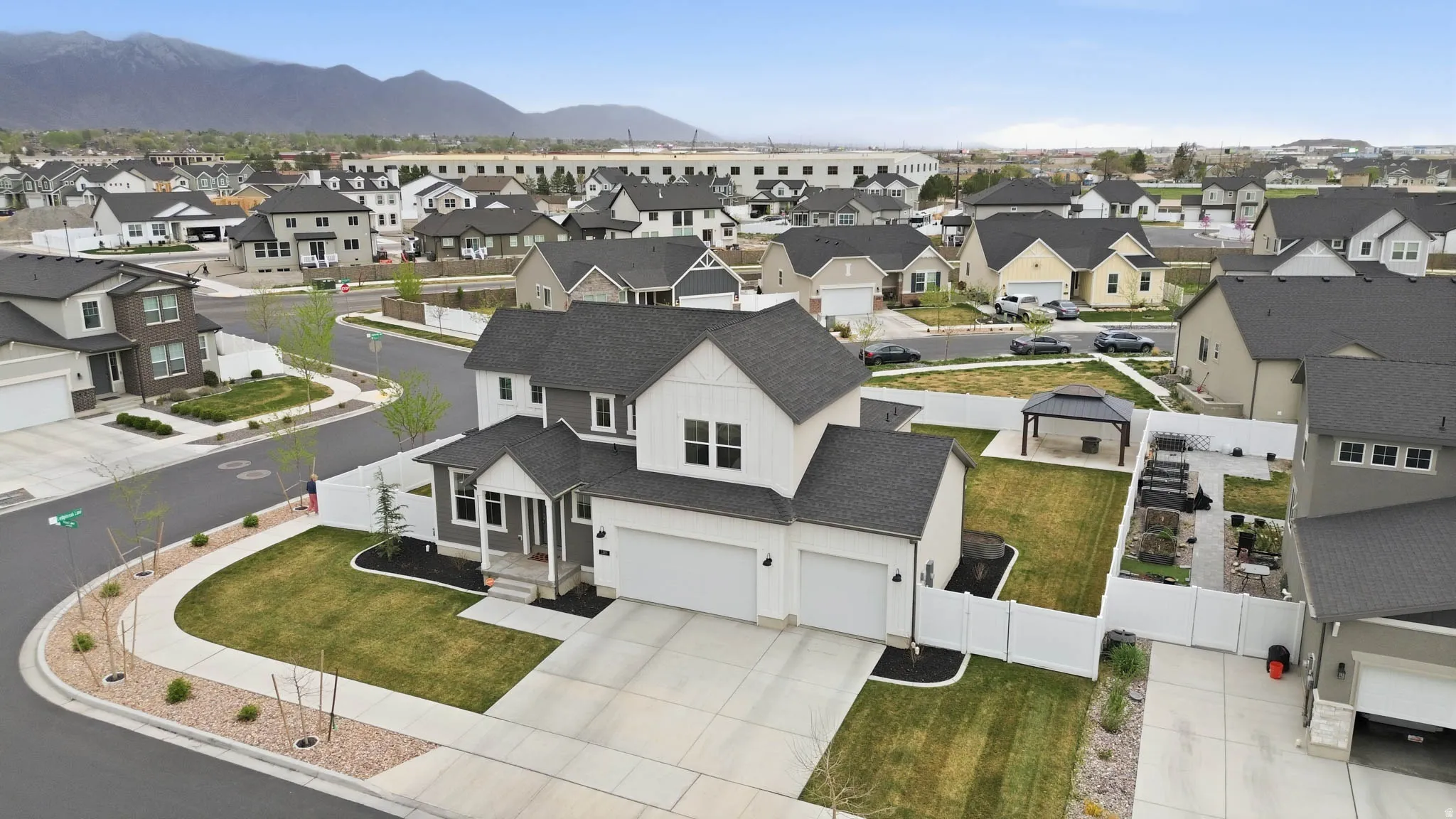 Aerial perspective of suburban area featuring mountains