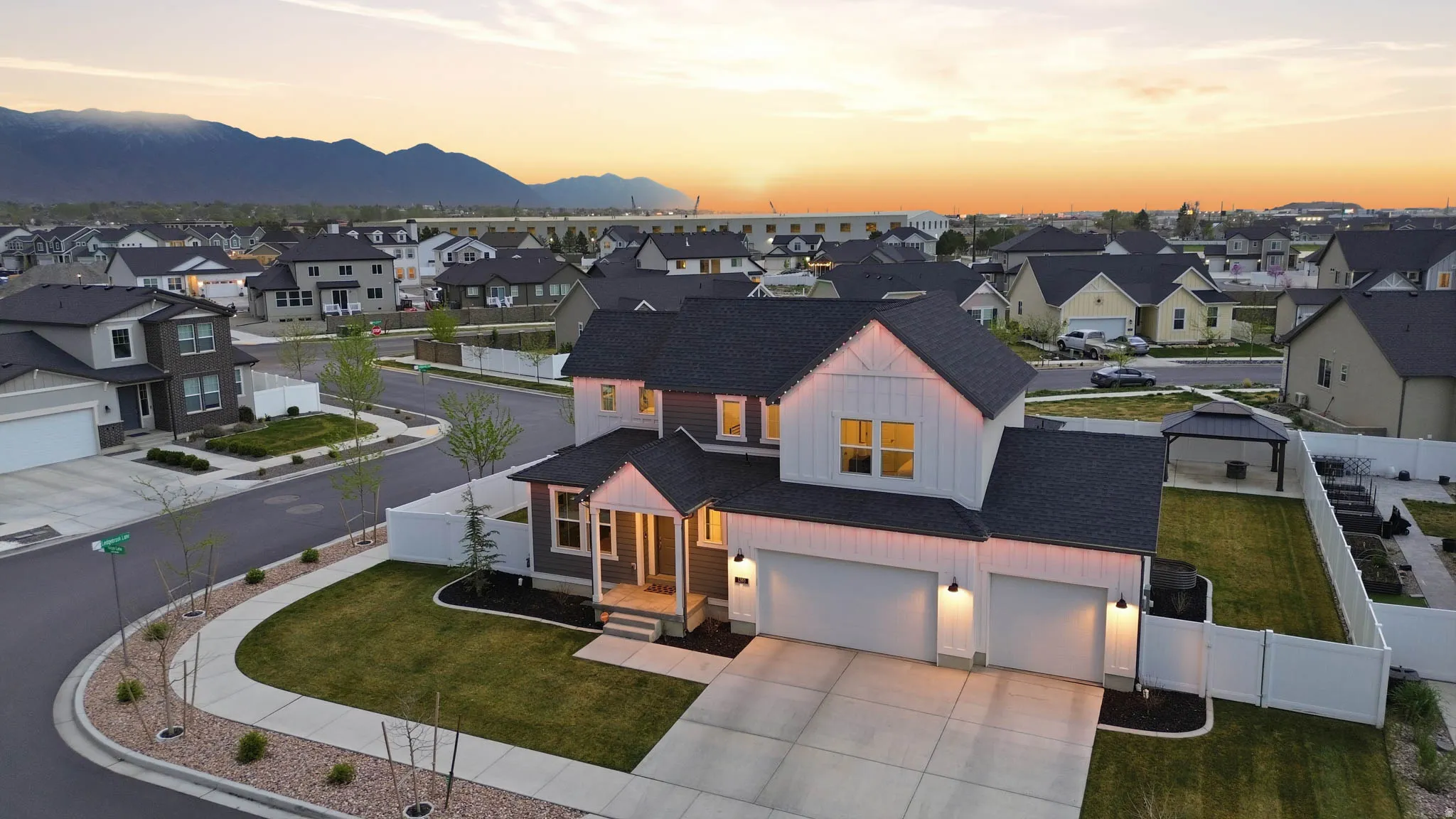 Aerial view at dusk of a mountain view and a residential view