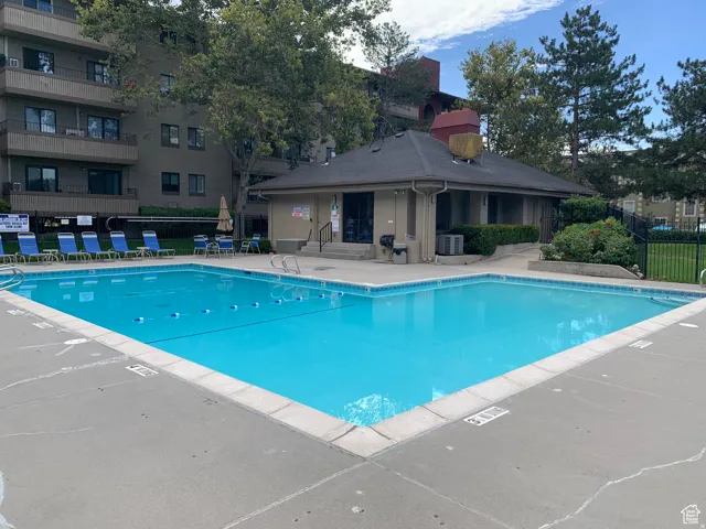 Outdoor swimming pool with concrete decking