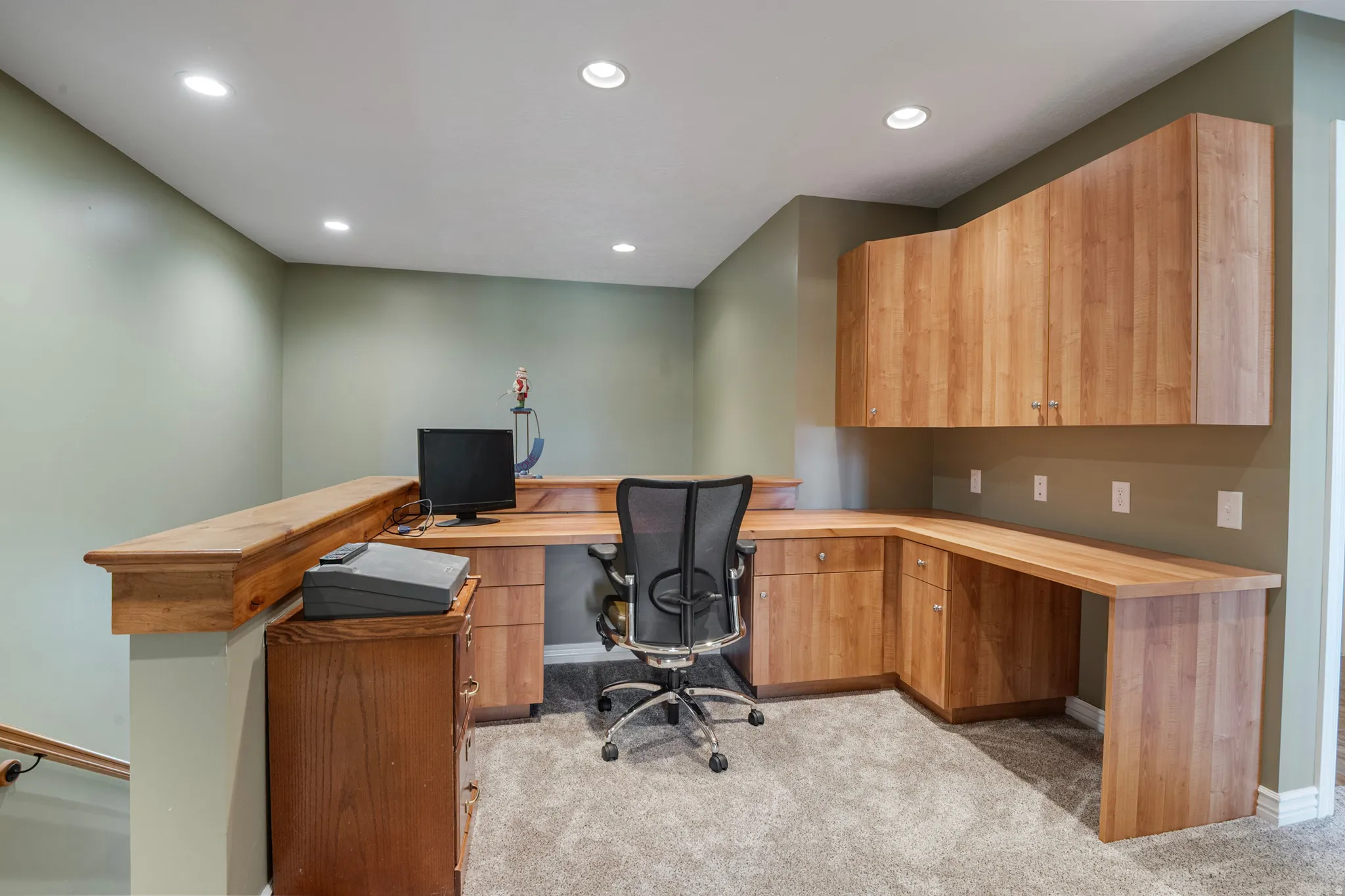 Office area featuring built in study area, light colored carpet, and recessed lighting