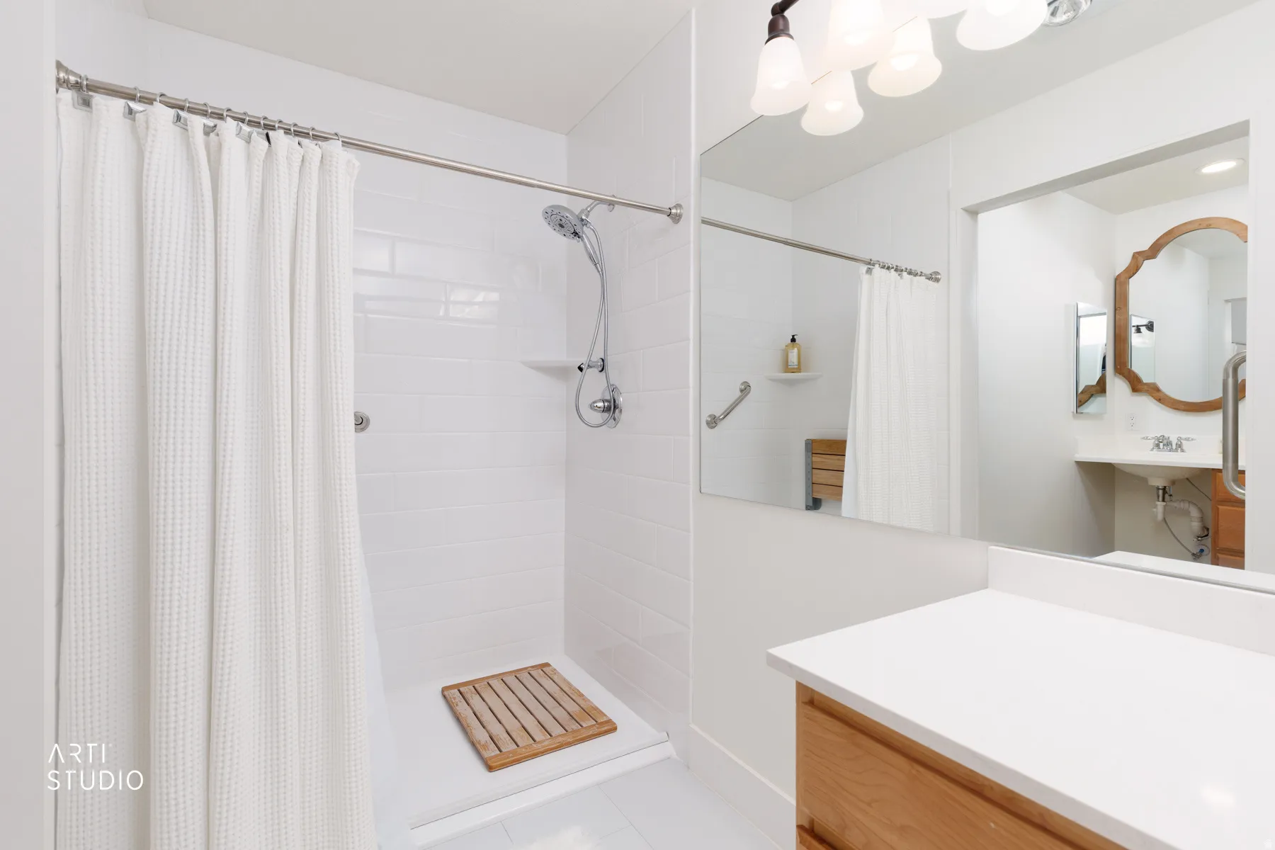 Full bath with a stall shower and vanity