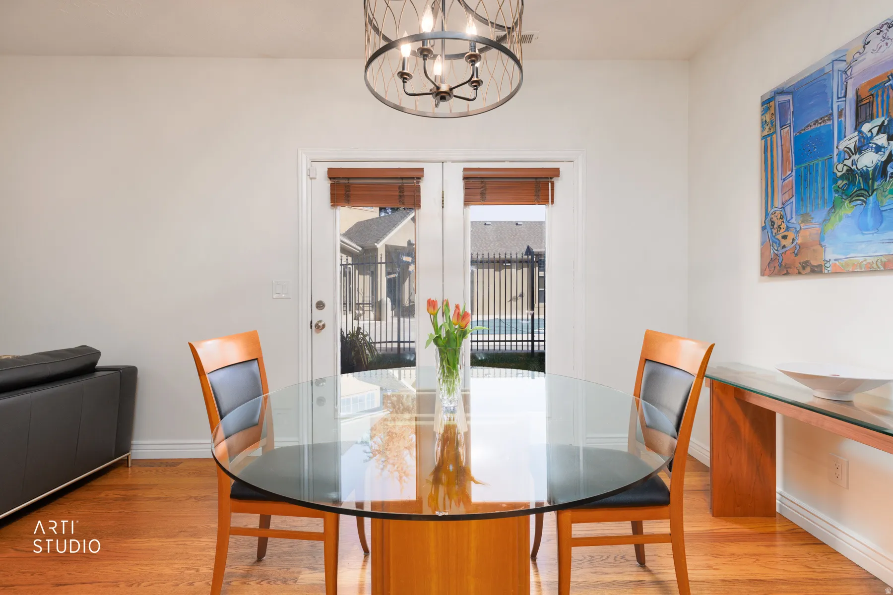 Dining area featuring a chandelier and light wood finished floors