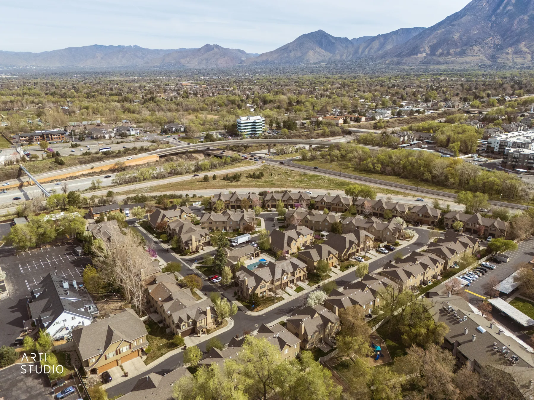 View of property location with nearby suburban area