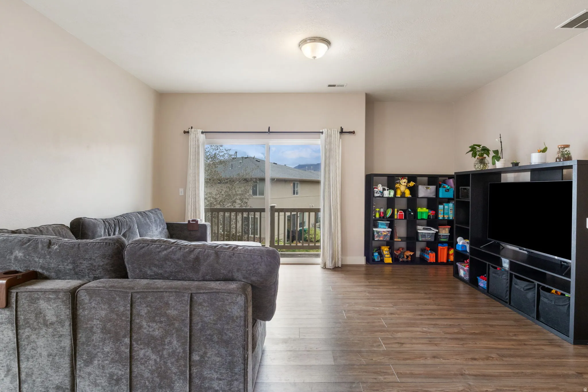 Living area with wood finished floors