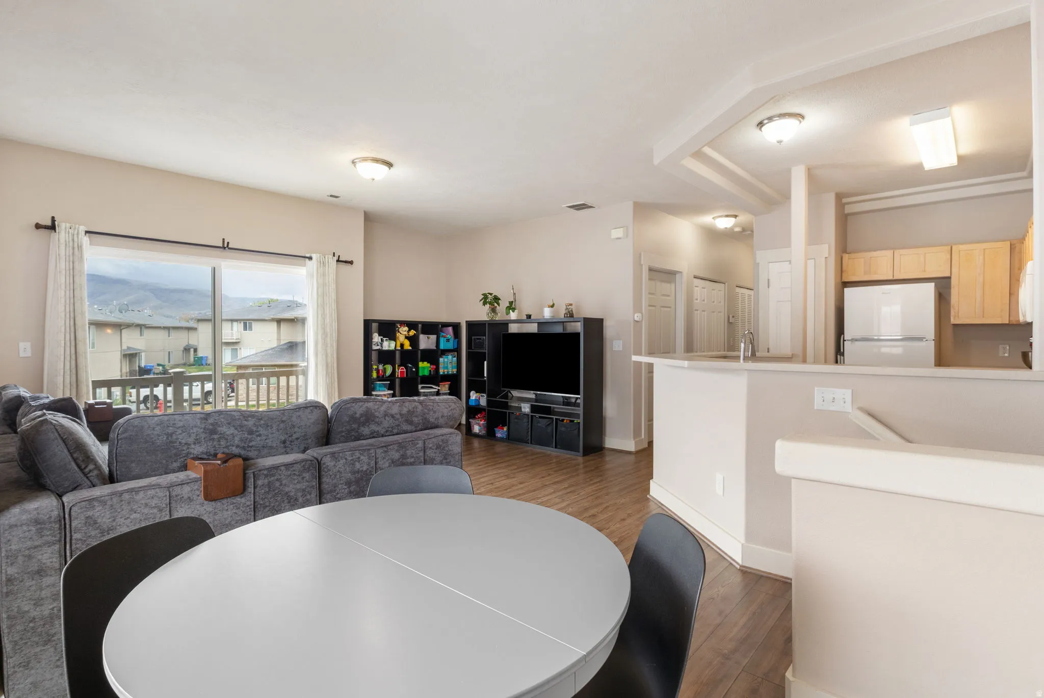 Dining room featuring light wood-style floors and baseboards