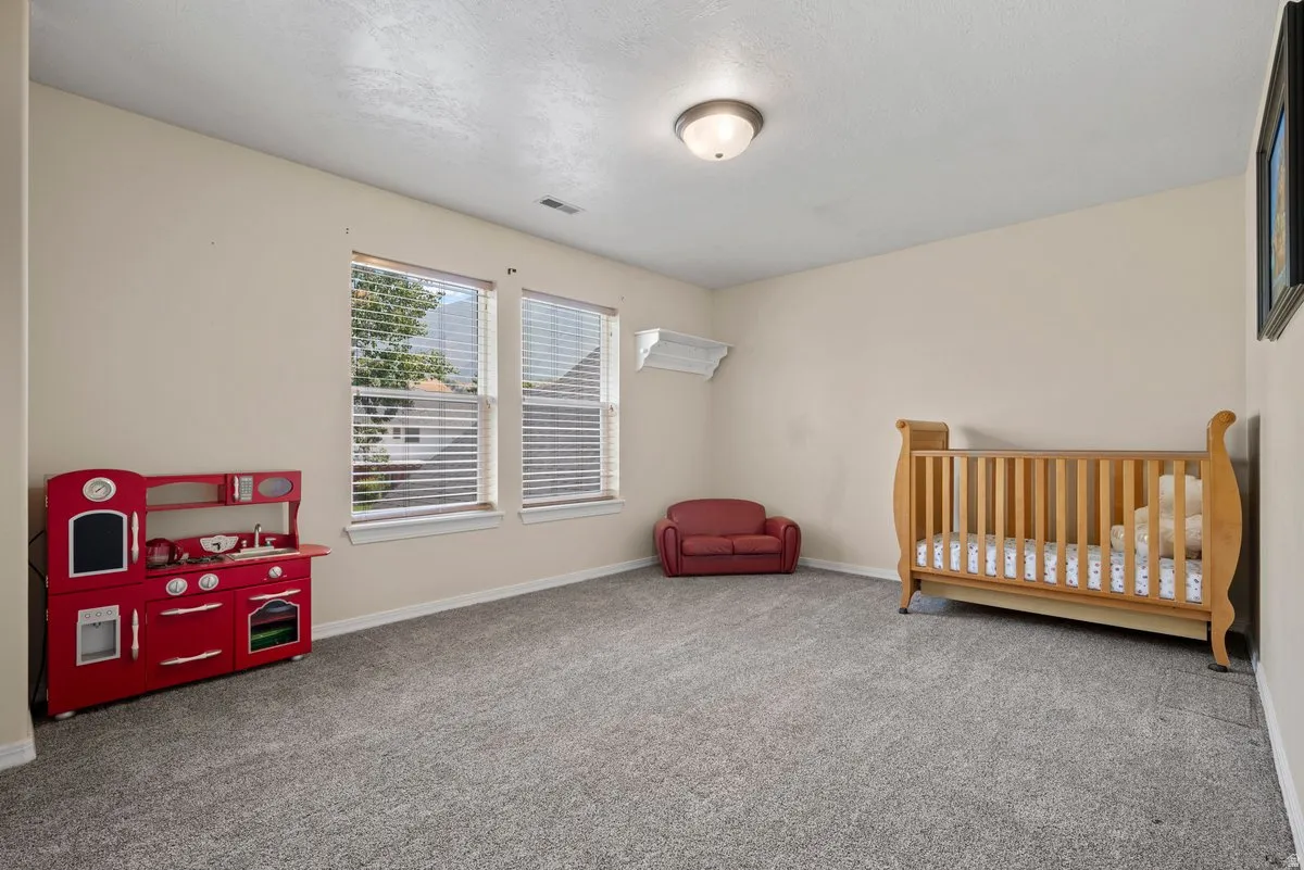Large bedroom with a huge walk in closet.Perfect for a playroom