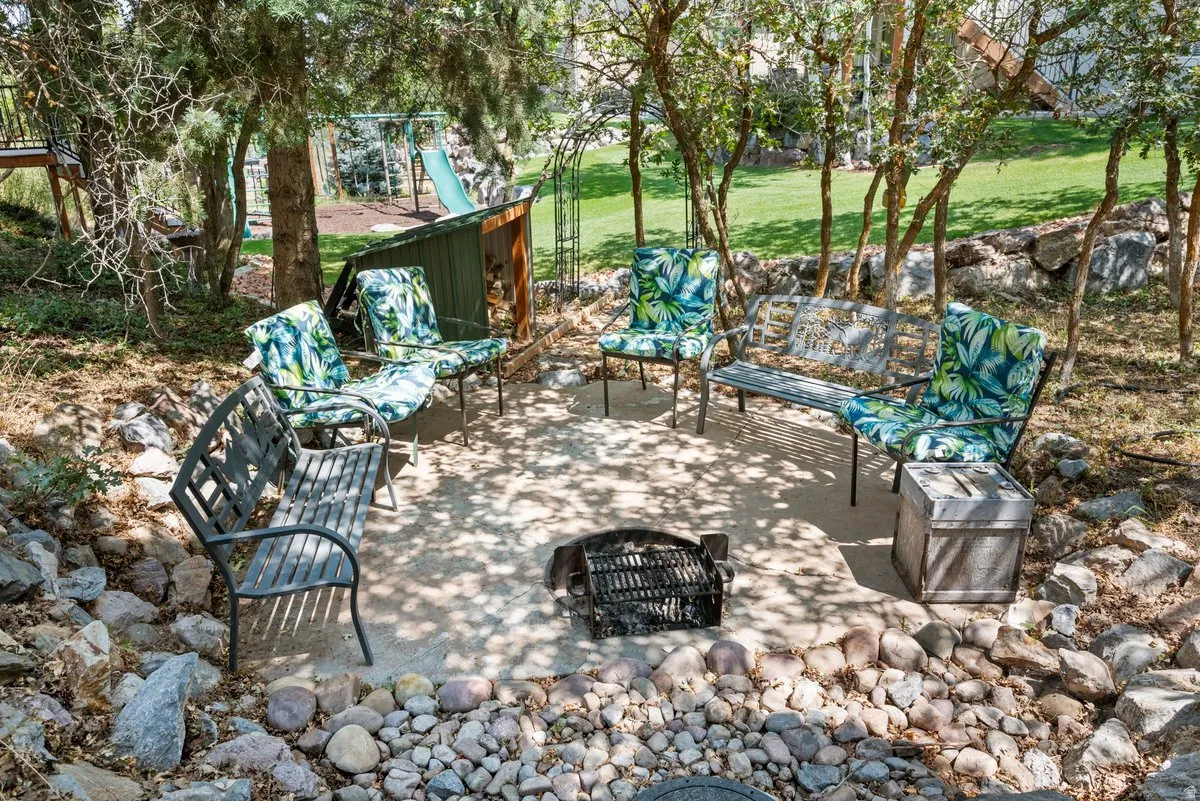Private and secluded firepit with woodshed and waterfall