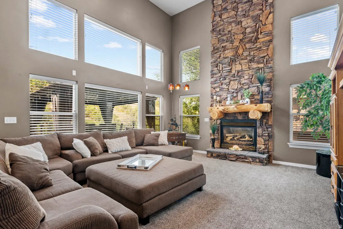 Spacious great room with lots of natural light and vaulted ceilings