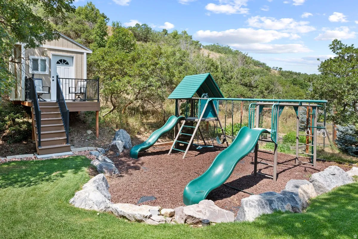 Custom playhouse is well built with its own dek and electricity. Sturdy solid custom playground