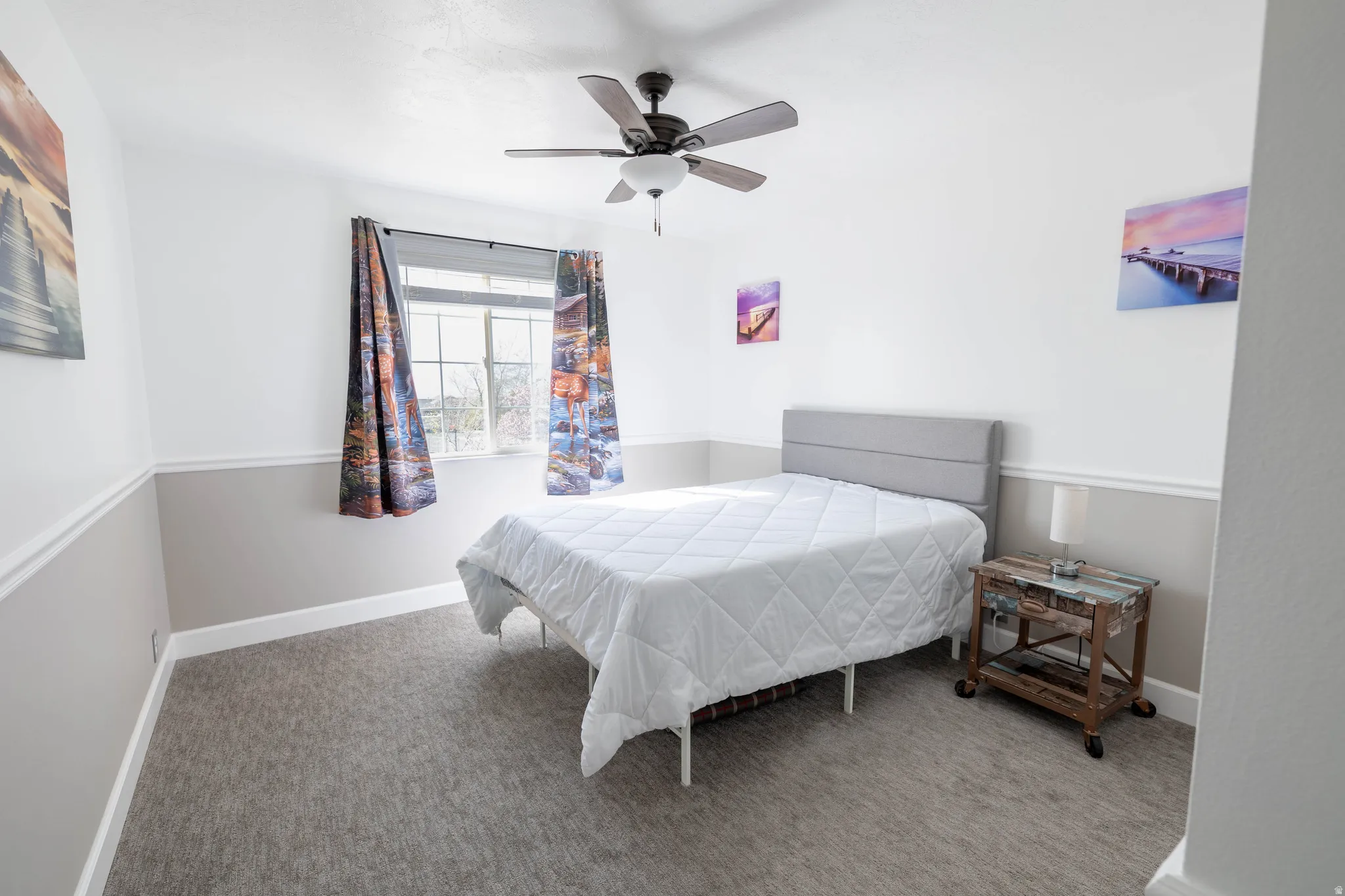 Bedroom featuring carpet floors and ceiling fan