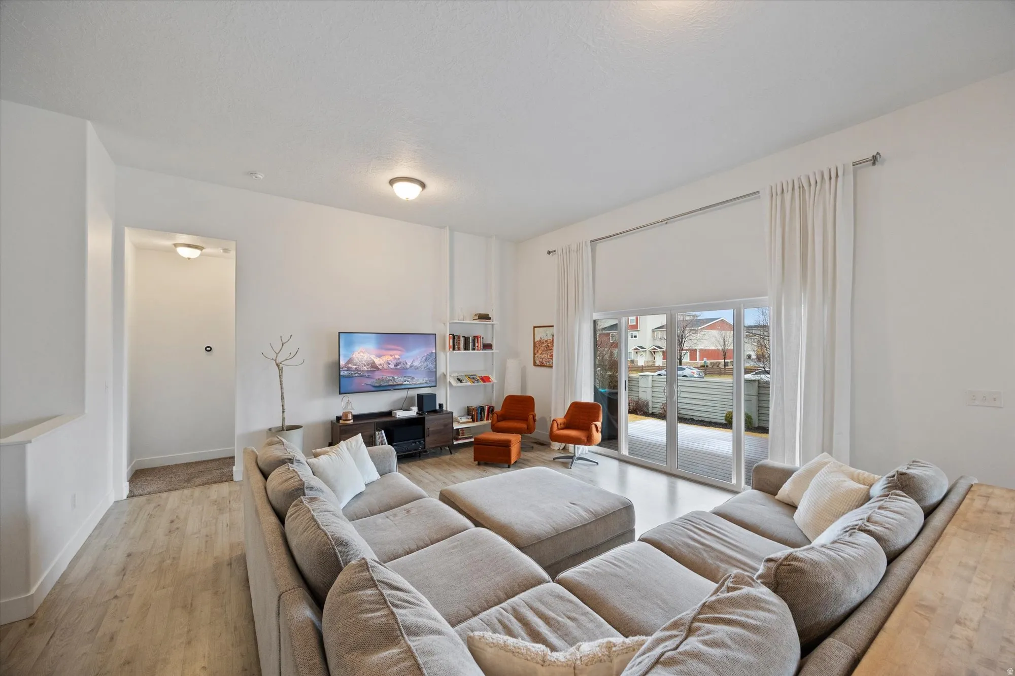 Living room featuring wood finished floors and baseboards