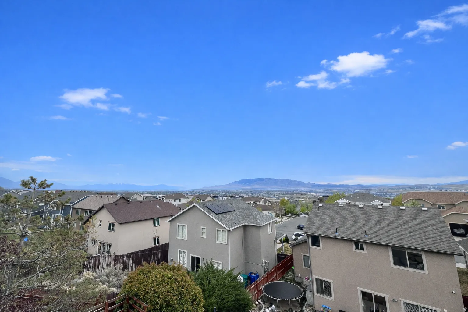 View of mountain background with nearby suburban area