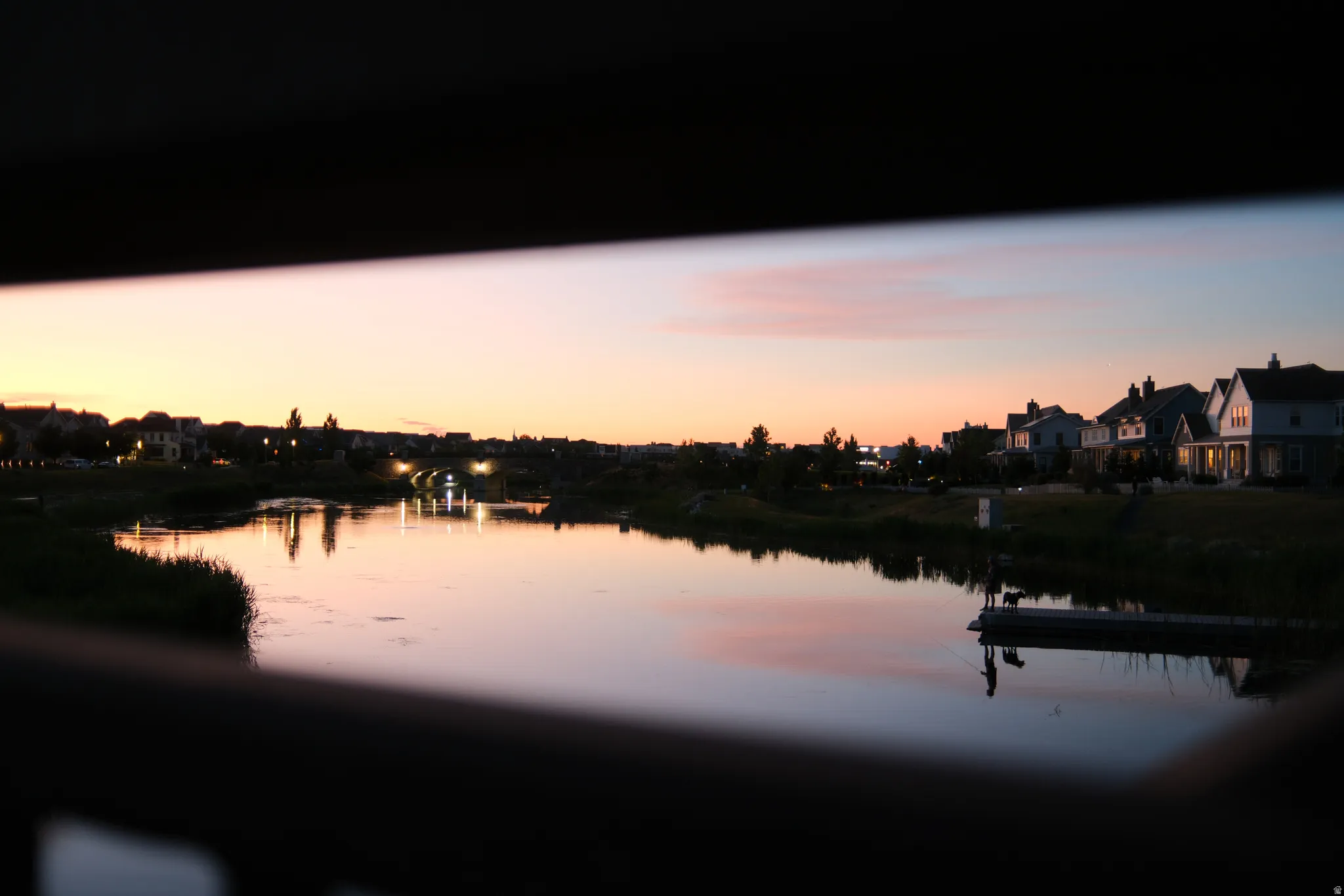 Water view featuring nearby suburban area