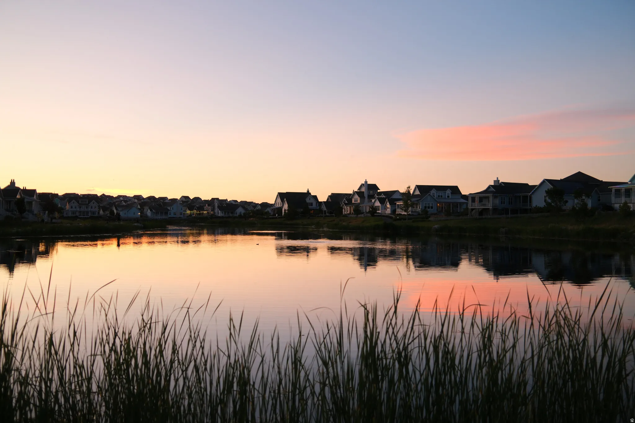 Water view with nearby suburban area