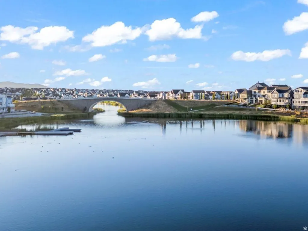 Water view featuring nearby suburban area