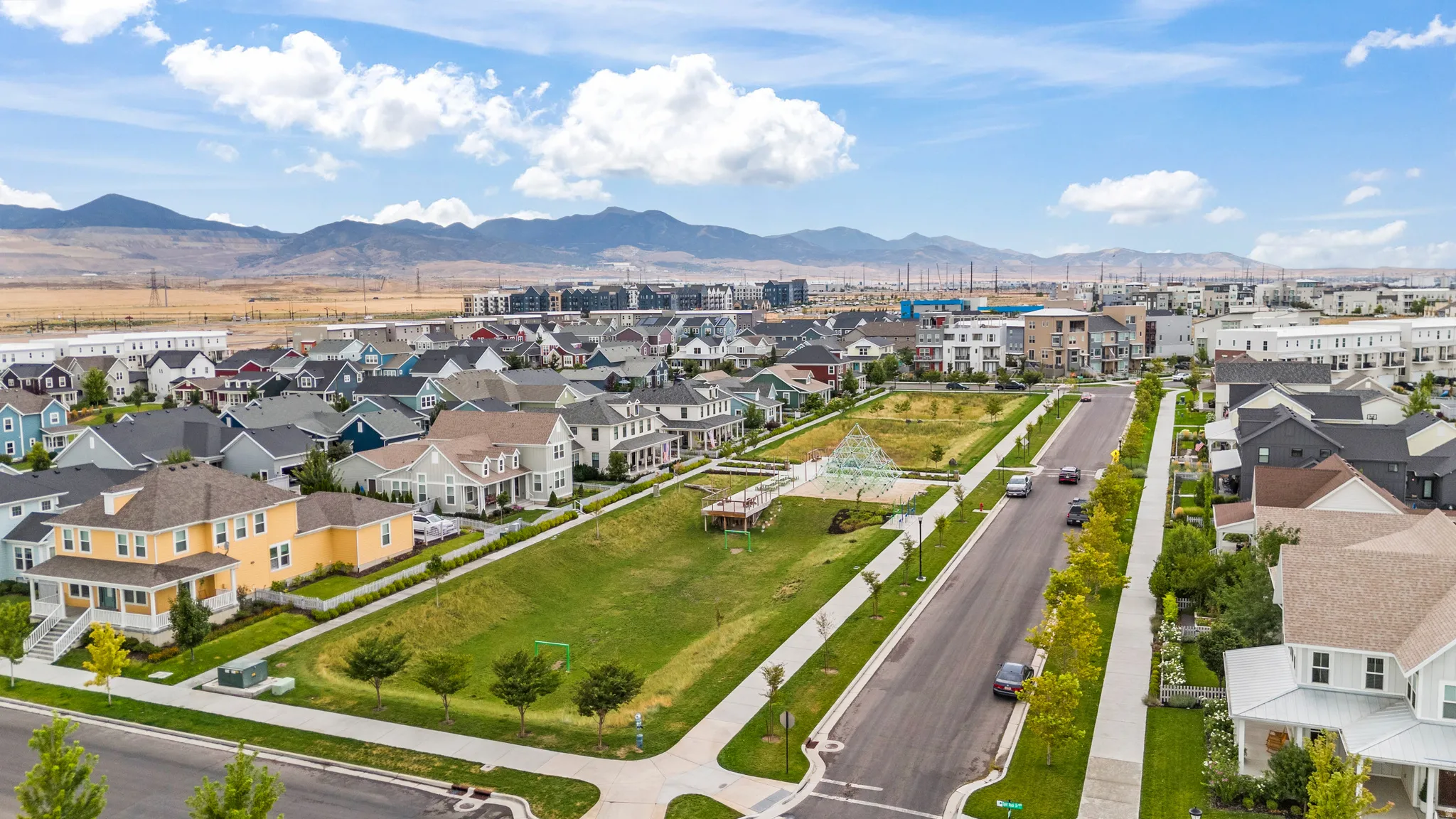 Aerial view of residential area with a mountainous background