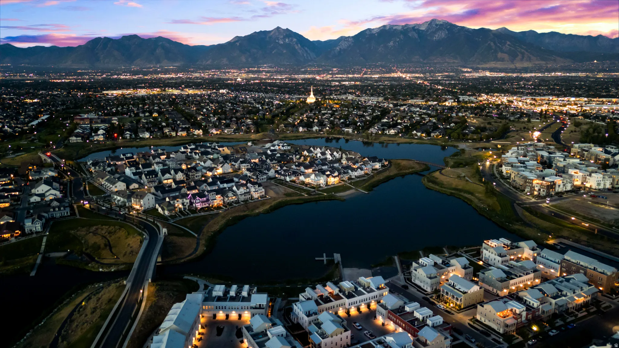 Aerial view at dusk of a mountain view and a residential view