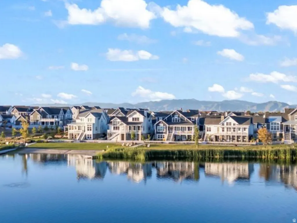 Water view featuring nearby suburban area