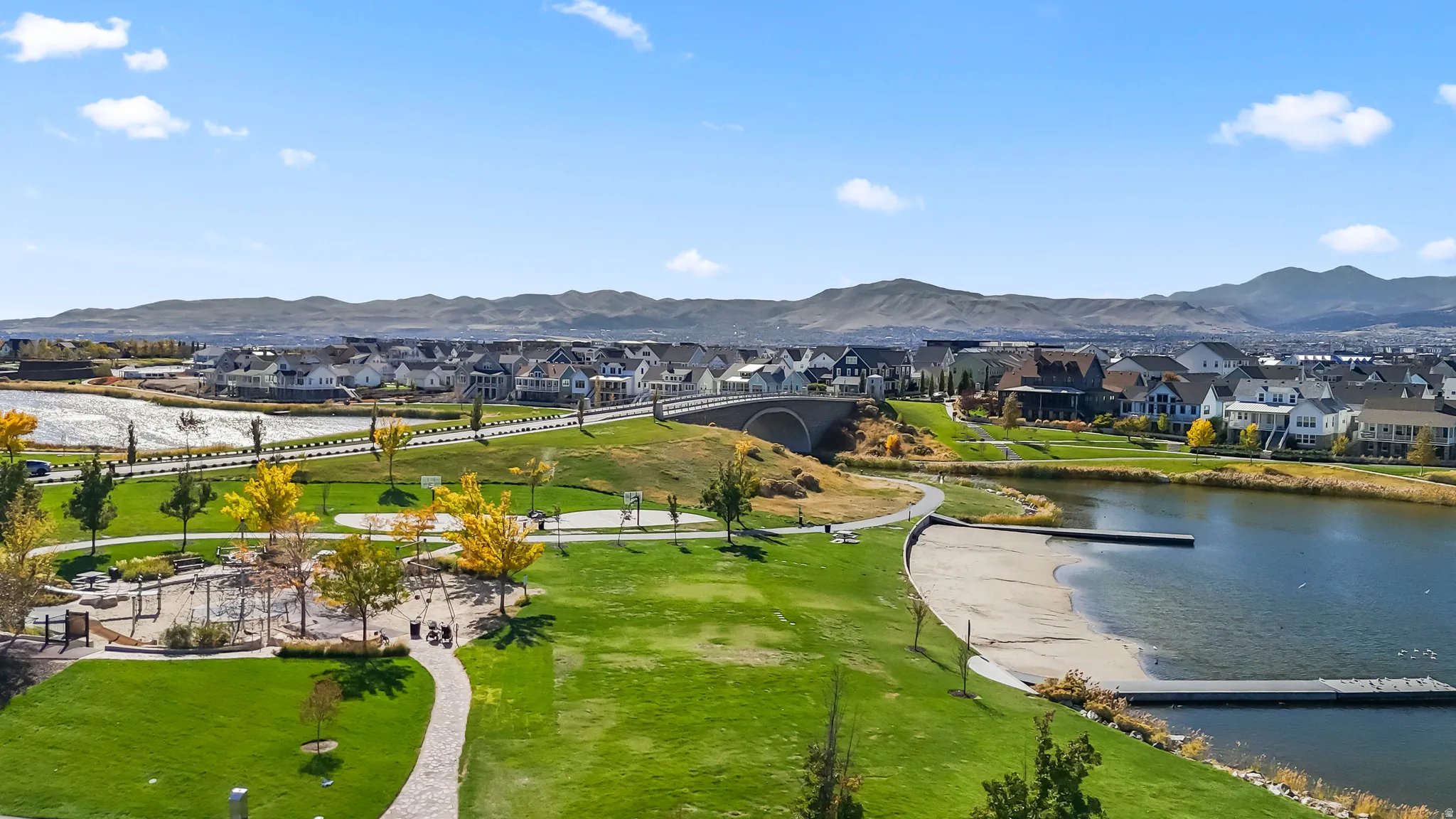 View of community featuring a water and mountain view and a residential view