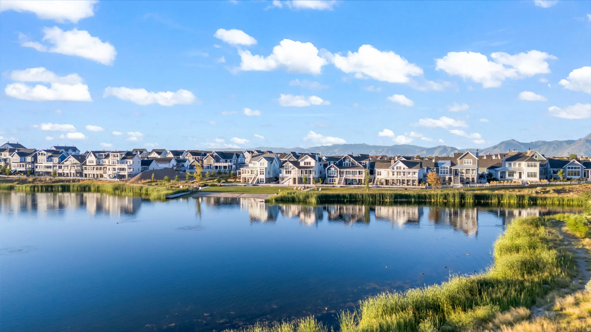 Water view featuring nearby suburban area