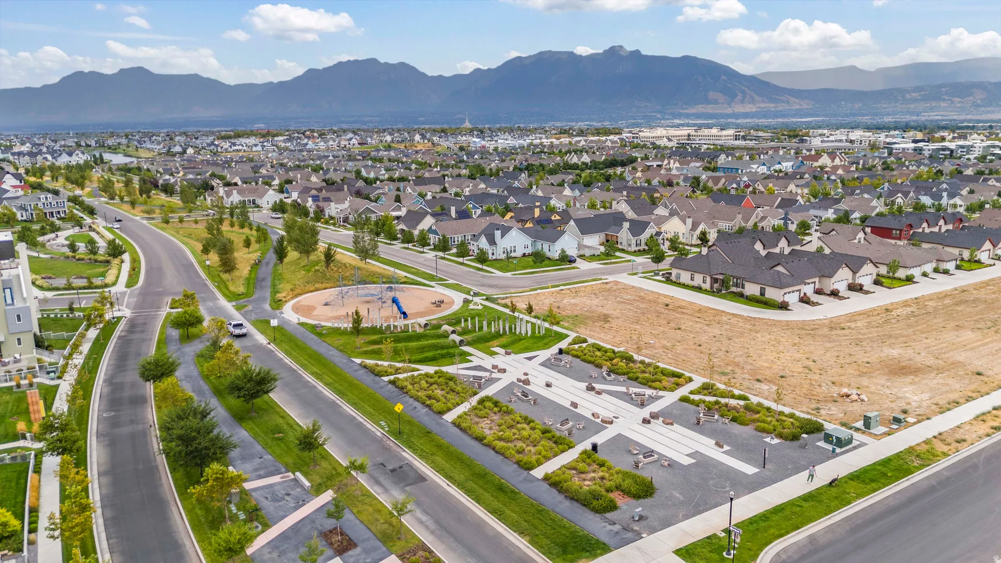 Aerial view of residential area with a mountainous background