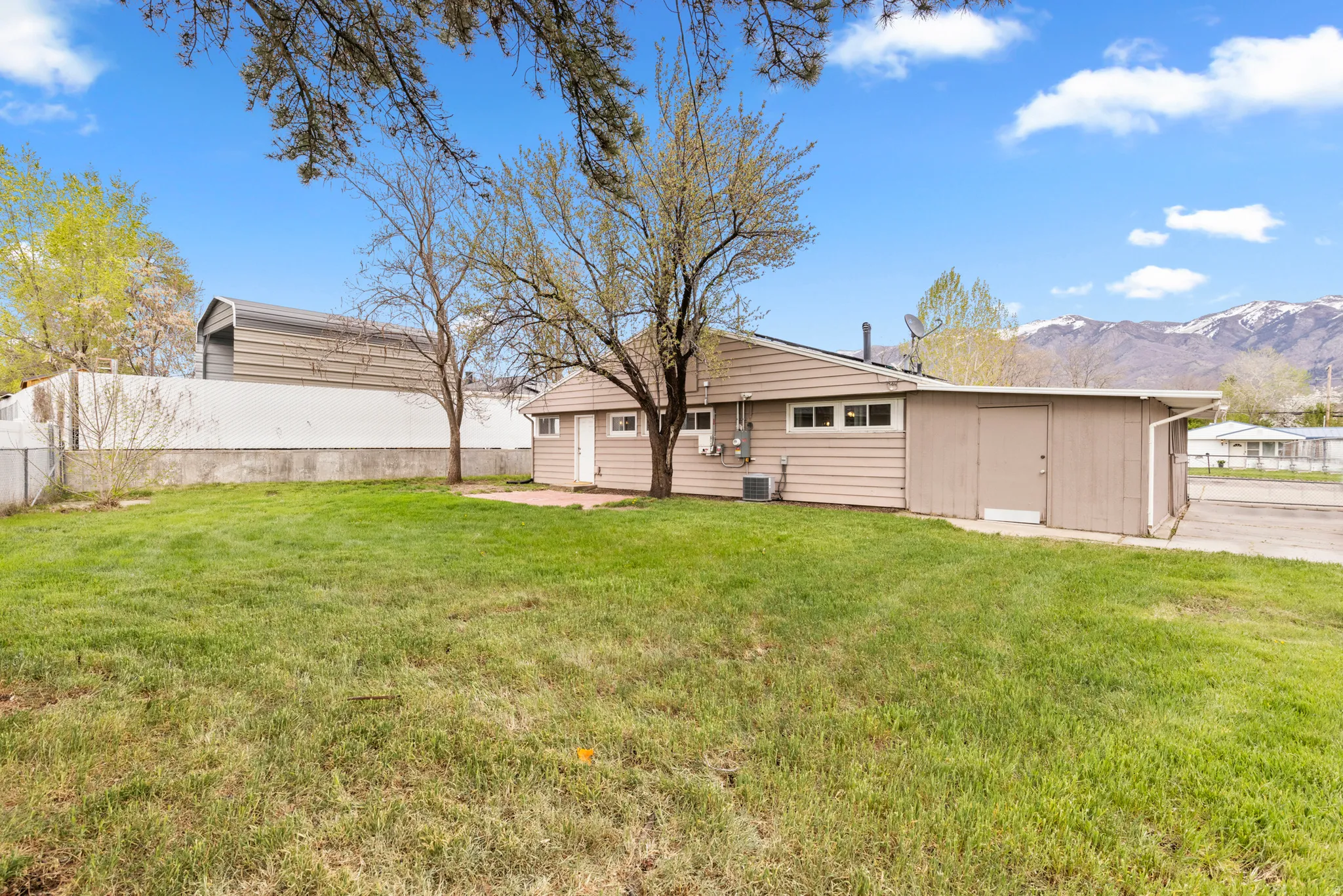 View of yard featuring a mountain view and a patio