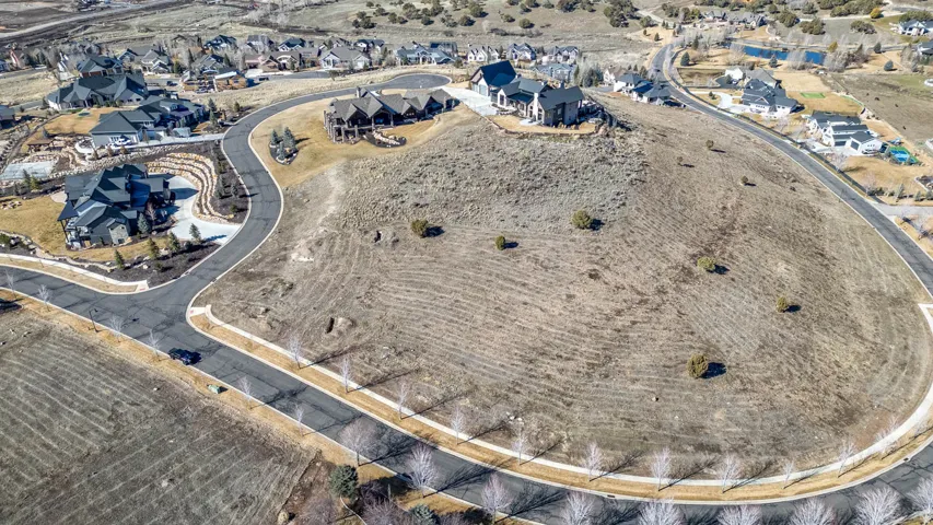 Aerial overview of property's location with nearby suburban area