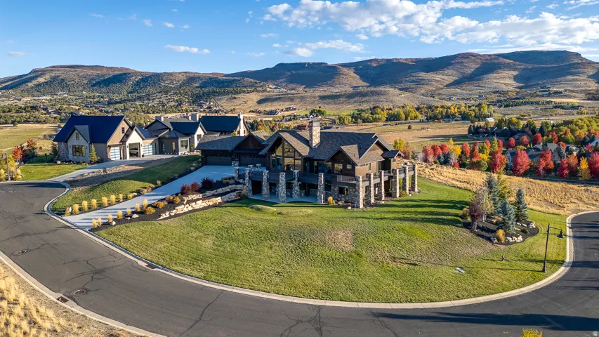 View from above of property featuring a mountainous background