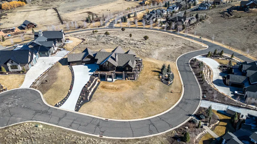 View of property location with nearby suburban area