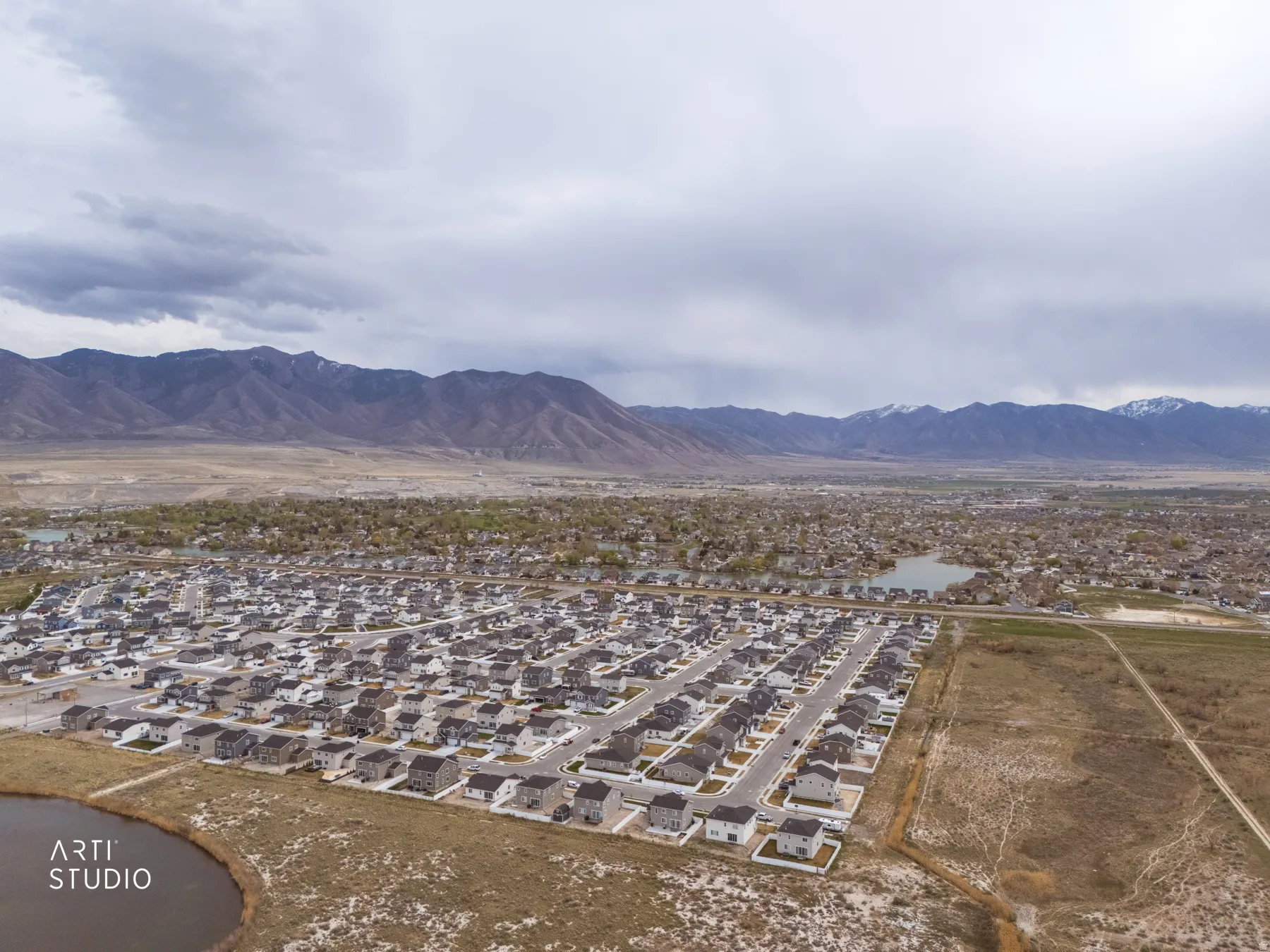 View of mountain backdrop with nearby suburban area