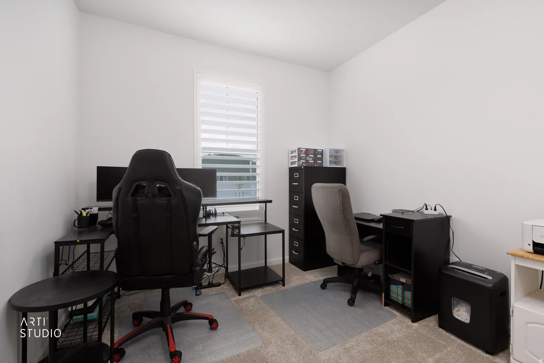 Home office with light carpet