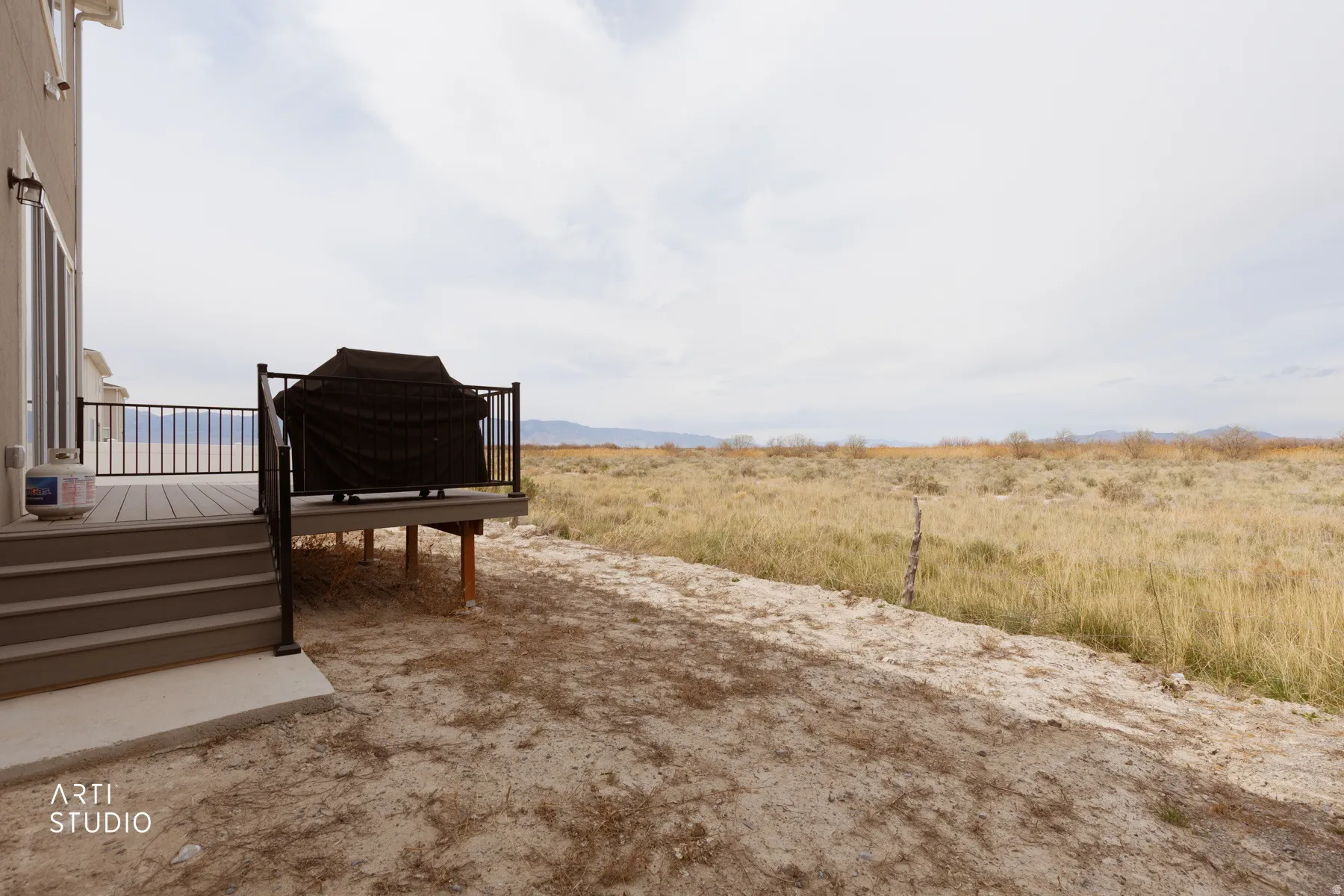 View of yard featuring a deck