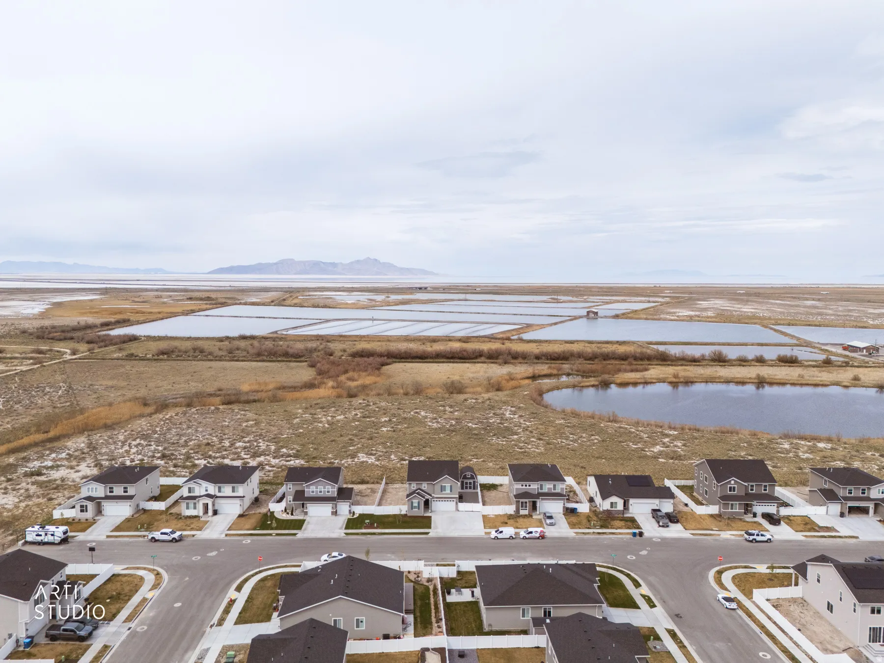 Aerial view of residential area with a water and mountain view