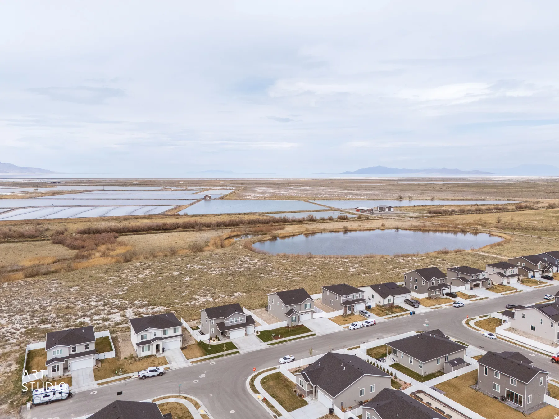 Aerial view of residential area with a water and mountain view