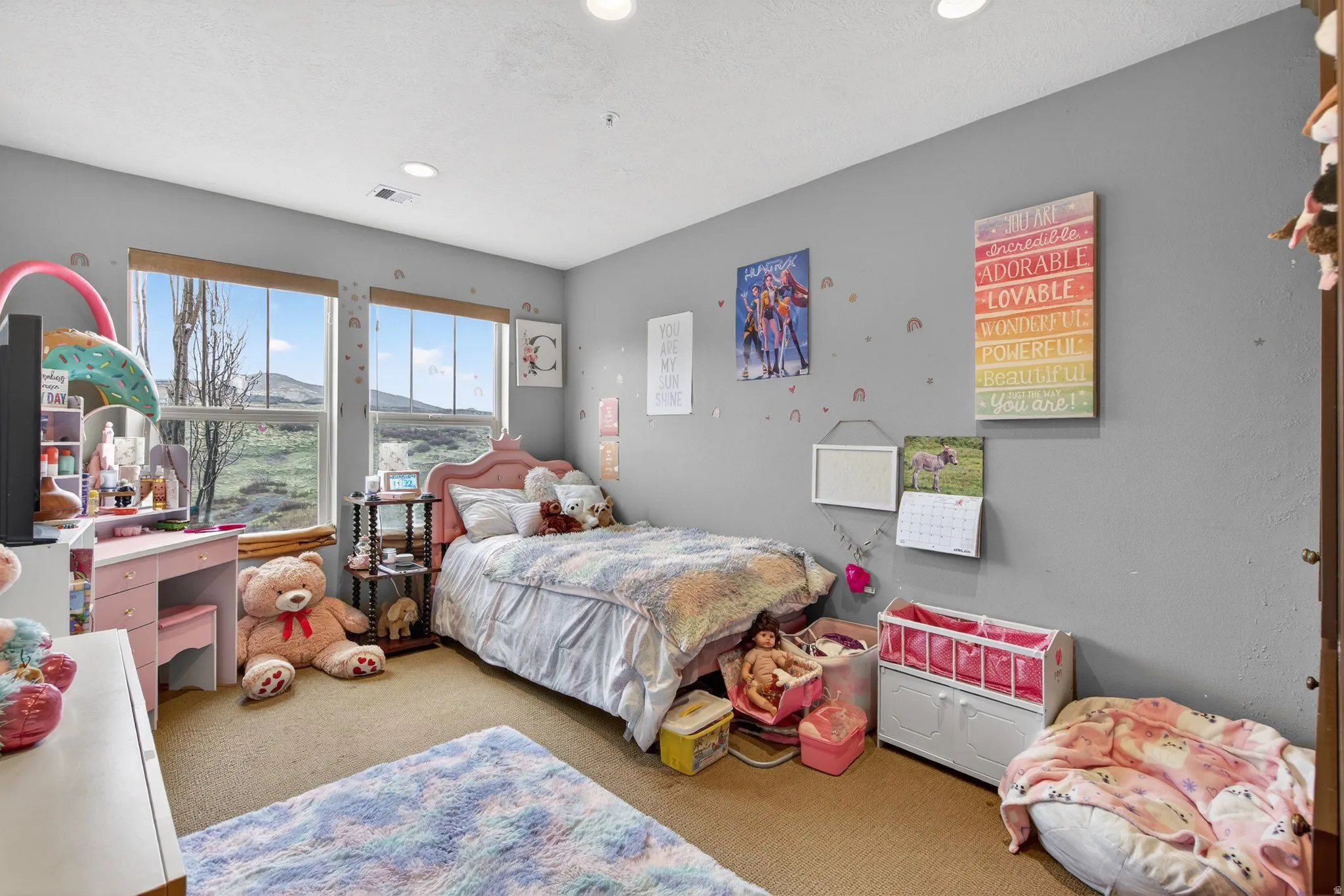 Bedroom with light carpet