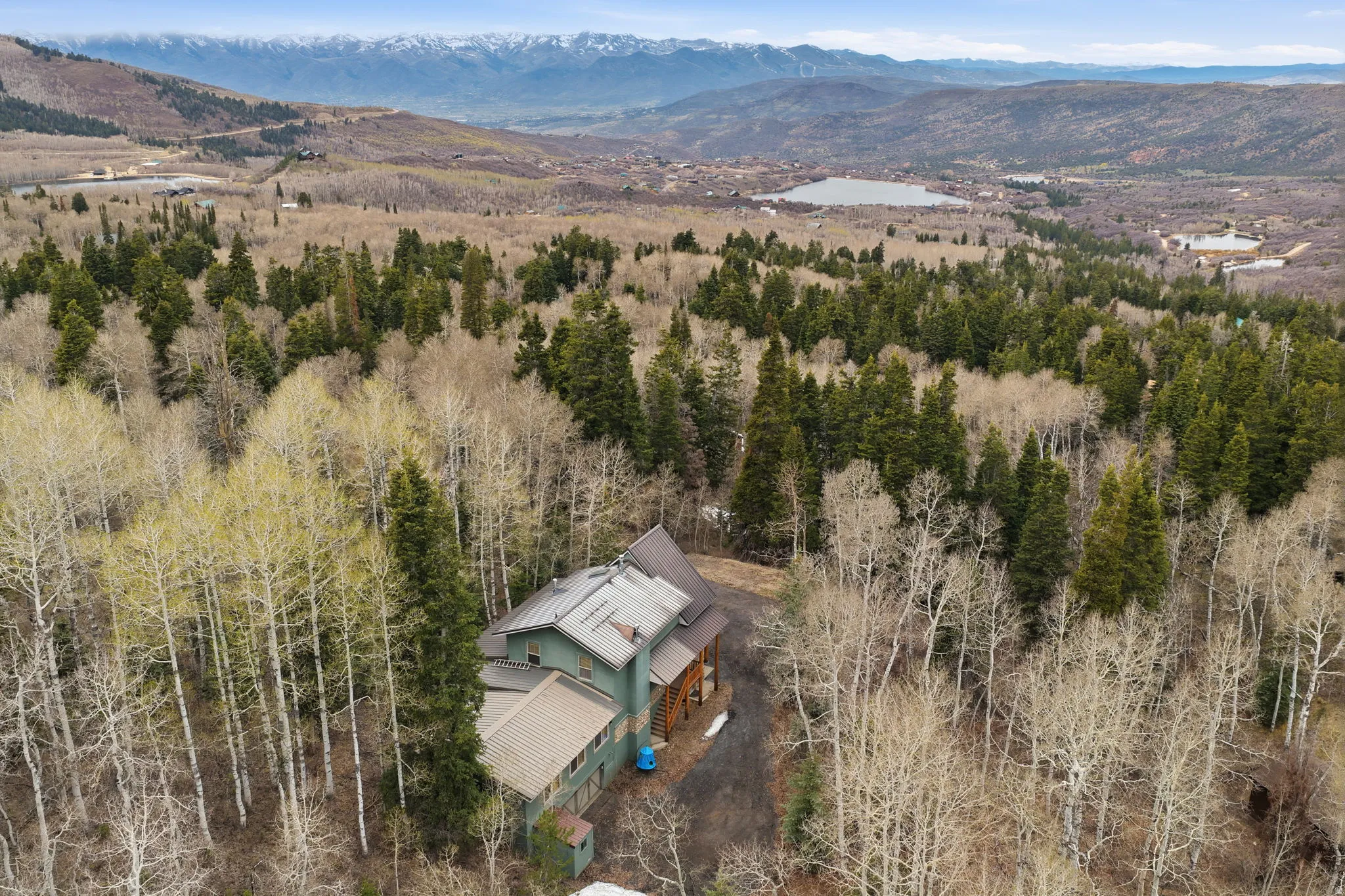 View of subject property with a mountain backdrop