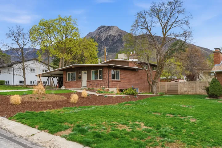 Mid Century style home with Mount Olympus over it's shoulder.